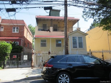 Three-family detached home offering excellent investment - photo 1