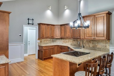 Tucked away on a beautifully landscaped 3/4-acre property, this - photo 14