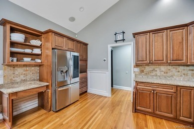 Tucked away on a beautifully landscaped 3/4-acre property, this - photo 16