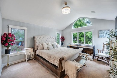 Tucked away on a beautifully landscaped 3/4-acre property, this - photo 19