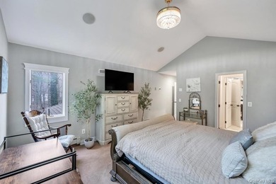 Tucked away on a beautifully landscaped 3/4-acre property, this - photo 20