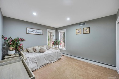 Tucked away on a beautifully landscaped 3/4-acre property, this - photo 25
