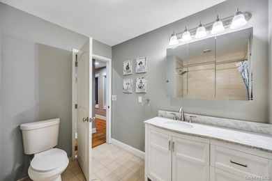 Tucked away on a beautifully landscaped 3/4-acre property, this - photo 28