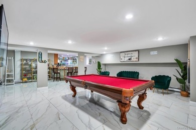 Tucked away on a beautifully landscaped 3/4-acre property, this - photo 29