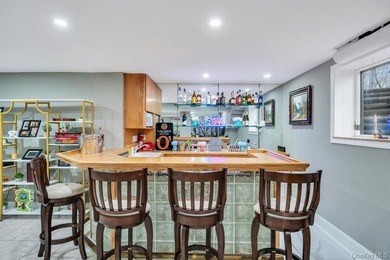 Tucked away on a beautifully landscaped 3/4-acre property, this - photo 32