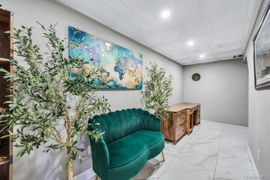 Tucked away on a beautifully landscaped 3/4-acre property, this - photo 35