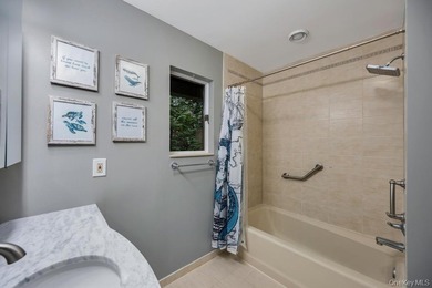 Tucked away on a beautifully landscaped 3/4-acre property, this - photo 36