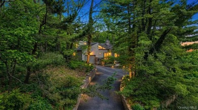 Tucked away on a beautifully landscaped 3/4-acre property, this - photo 37