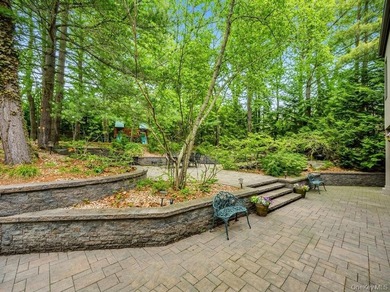 Tucked away on a beautifully landscaped 3/4-acre property, this - photo 38
