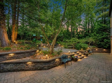 Tucked away on a beautifully landscaped 3/4-acre property, this - photo 39