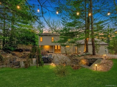 Tucked away on a beautifully landscaped 3/4-acre property, this - photo 42