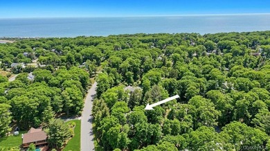 Tucked away on a beautifully landscaped 3/4-acre property, this - photo 43