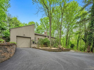 Tucked away on a beautifully landscaped 3/4-acre property, this - photo 46