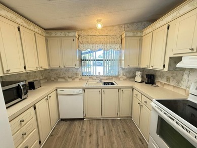 This move-in ready 2 bedroom, 2 bathroom home in the 55+ - photo 3