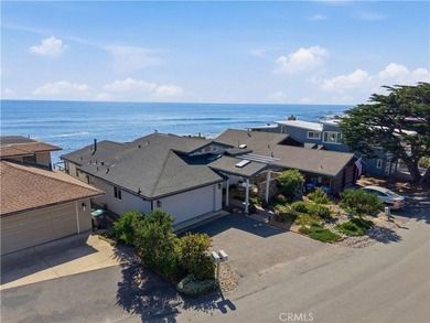 Perched directly on the sands of one of Cambria's most coveted - photo 4