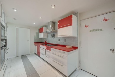 Unique two-story townhome-style residence offering approximately