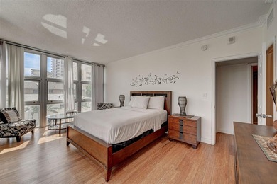 Unique two-story townhome-style residence offering approximately