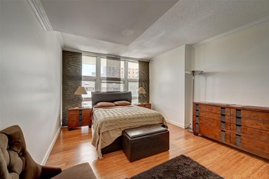 Unique two-story townhome-style residence offering approximately