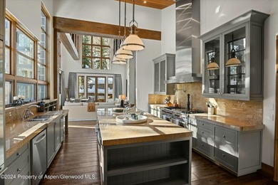 Located in the exclusive Maroon Creek Club, this timeless - photo 9