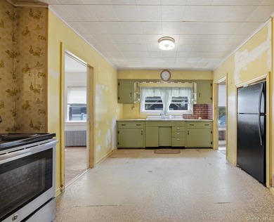 Welcome to 109 Grove Avenue, a 3-bedroom, 1-bath ranch set on a - photo 5