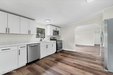 Completely remodeled inside and out, this move-in ready home on - photo 14