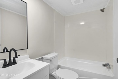 Completely remodeled inside and out, this move-in ready home on - photo 32