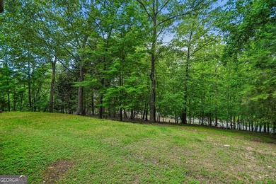 Lake Lanier convenience without the high price tag! Nestled on a - photo 29