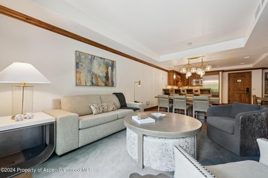 The Aspen Mountain Residences is nestled at the base of the - photo 6