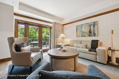 The Aspen Mountain Residences is nestled at the base of the - photo 7
