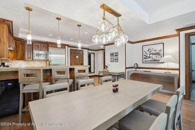 The Aspen Mountain Residences is nestled at the base of the - photo 9