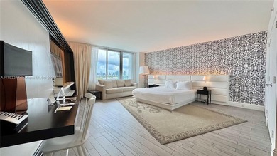 High-floor furnished studio with wide bay views. Part of the