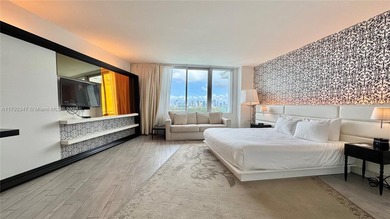 High-floor furnished studio with wide bay views. Part of the