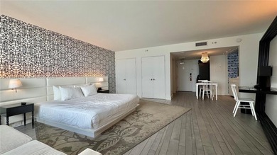 High-floor furnished studio with wide bay views. Part of the