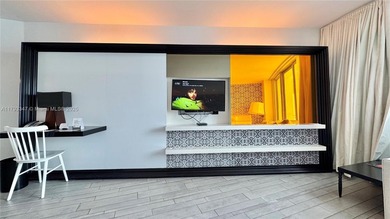 High-floor furnished studio with wide bay views. Part of the