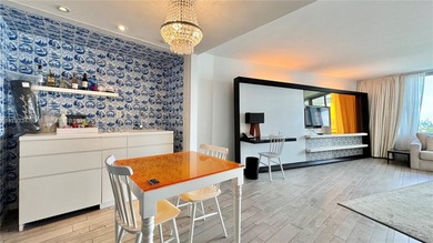 High-floor furnished studio with wide bay views. Part of the