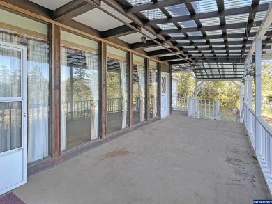 This beautiful acreage has views, pond, and treed setting with