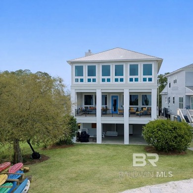 Coastal luxury meets laid-back waterfront living in this - photo 1