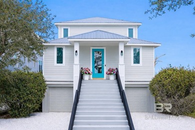 Coastal luxury meets laid-back waterfront living in this - photo 3