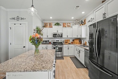 This Southaven showstopper offers beautiful water views right - photo 14