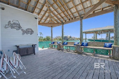Coastal luxury meets laid-back waterfront living in this - photo 8