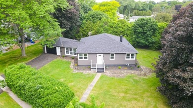 This is a 10/10! Beautifully transformed spacious ranch in the - photo 1