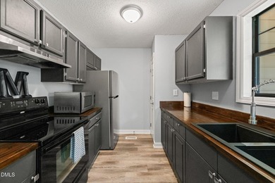 Welcome to this charming end-unit townhome in the desirable - photo 13