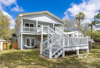 ENJOY BEAUTIFUL SUNSETS AND BAYFRONT LIVING EVERYDAY. This - photo 1