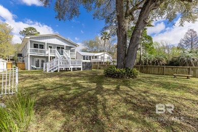 ENJOY BEAUTIFUL SUNSETS AND BAYFRONT LIVING EVERYDAY. This - photo 2