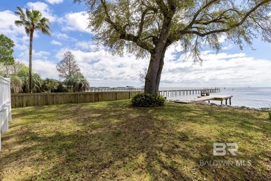 ENJOY BEAUTIFUL SUNSETS AND BAYFRONT LIVING EVERYDAY. This - photo 3