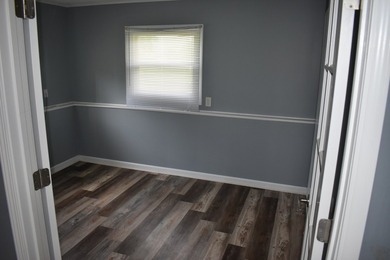 Well cared for, vinyl sided Lakefront home with 94' of frontage - photo 5
