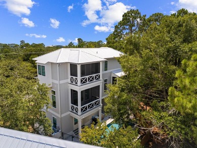 Completed in 2023, this stunning three-story beach house is - photo 2
