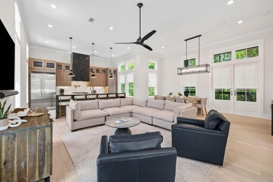 Completed in 2023, this stunning three-story beach house is - photo 3