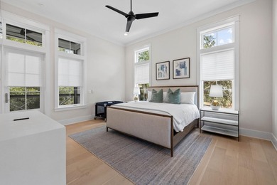 Completed in 2023, this stunning three-story beach house is - photo 7