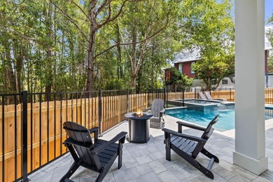 Completed in 2023, this stunning three-story beach house is - photo 9